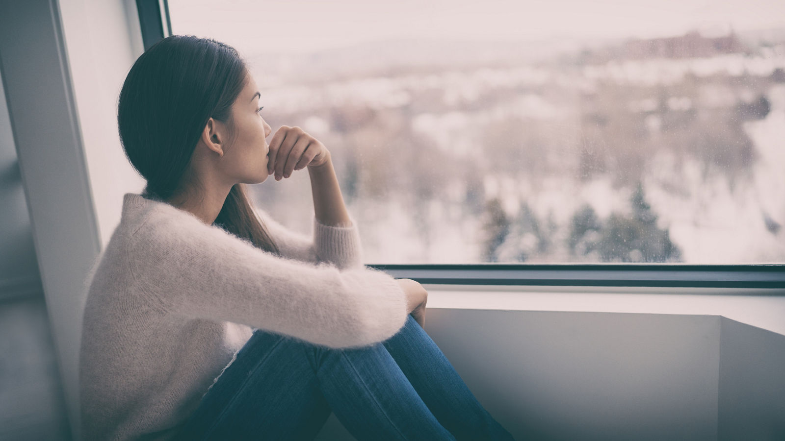 Depression, mental health, psychology therapy - mind wellness well being Asian girl with winter blues seasonal affective disorder feeling sad or heart broken with breakup alone. Loneliness, burnout , despair.