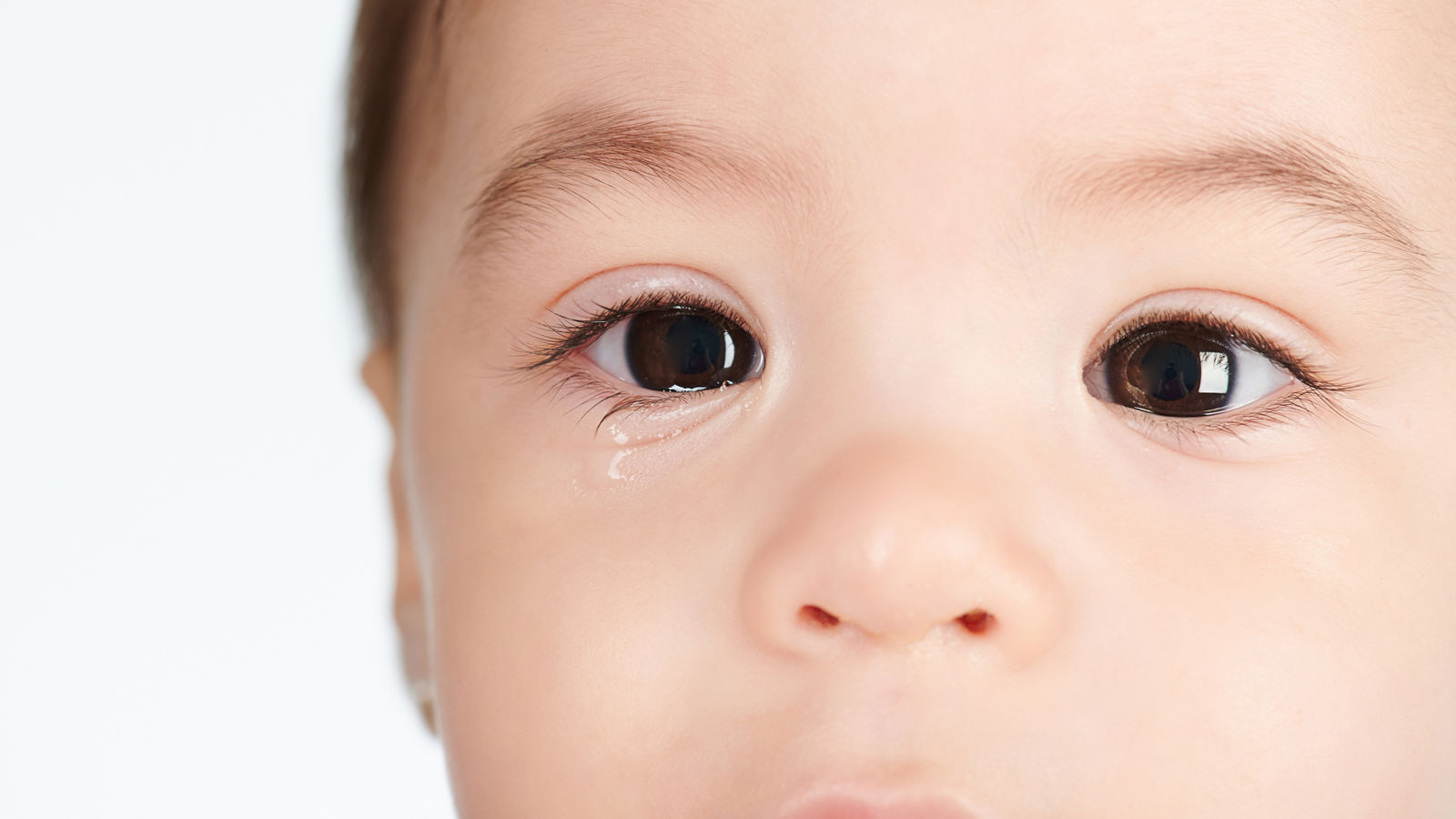Sad crying little baby girl