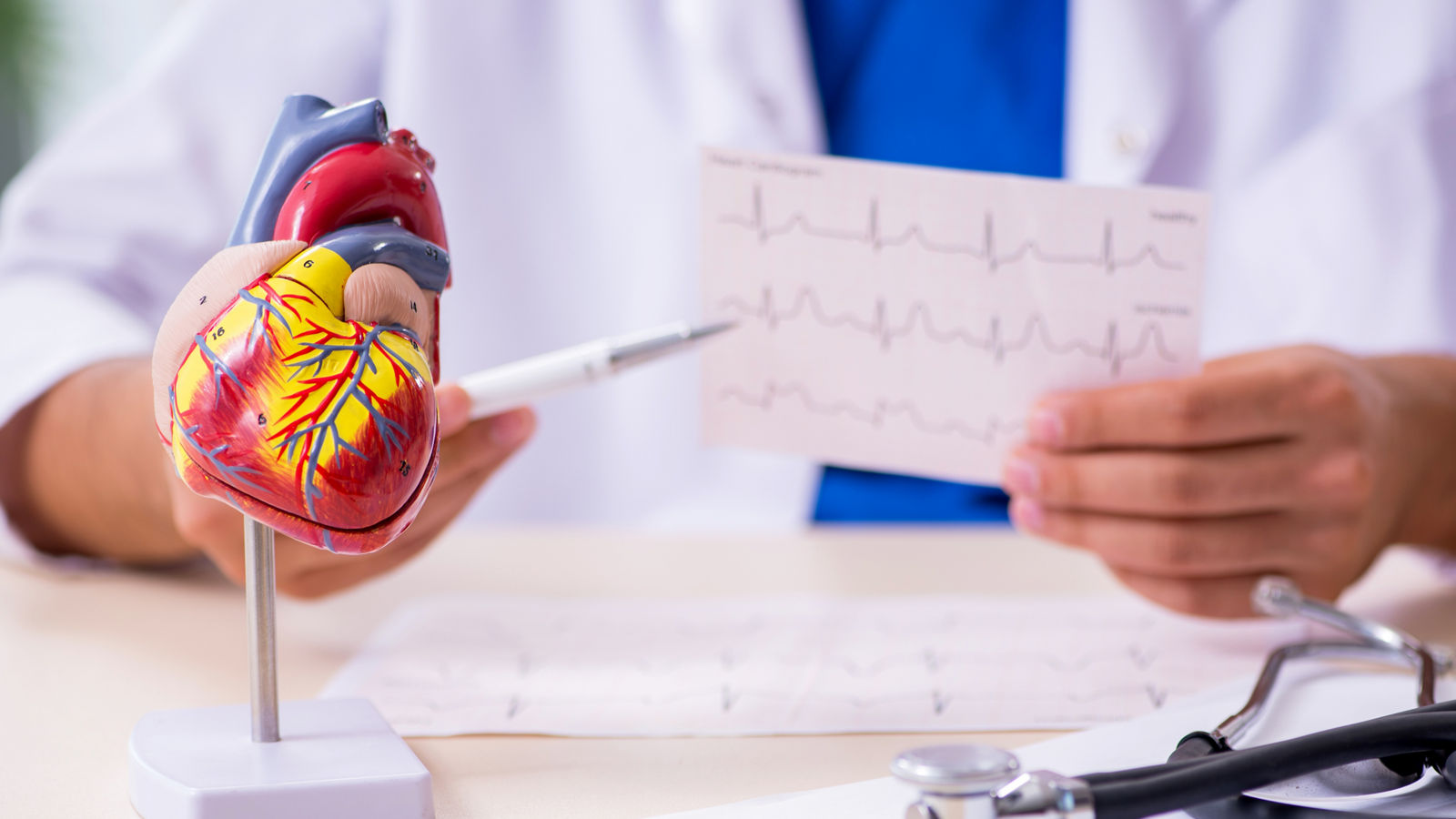 Young male doctor cardiologist working in the clinic