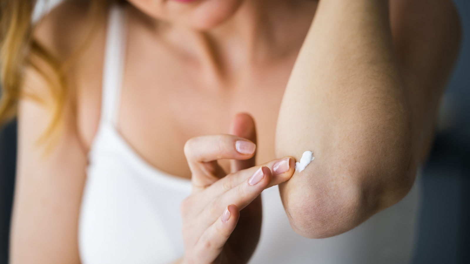 Applying Cream On Healthy Dry Skin