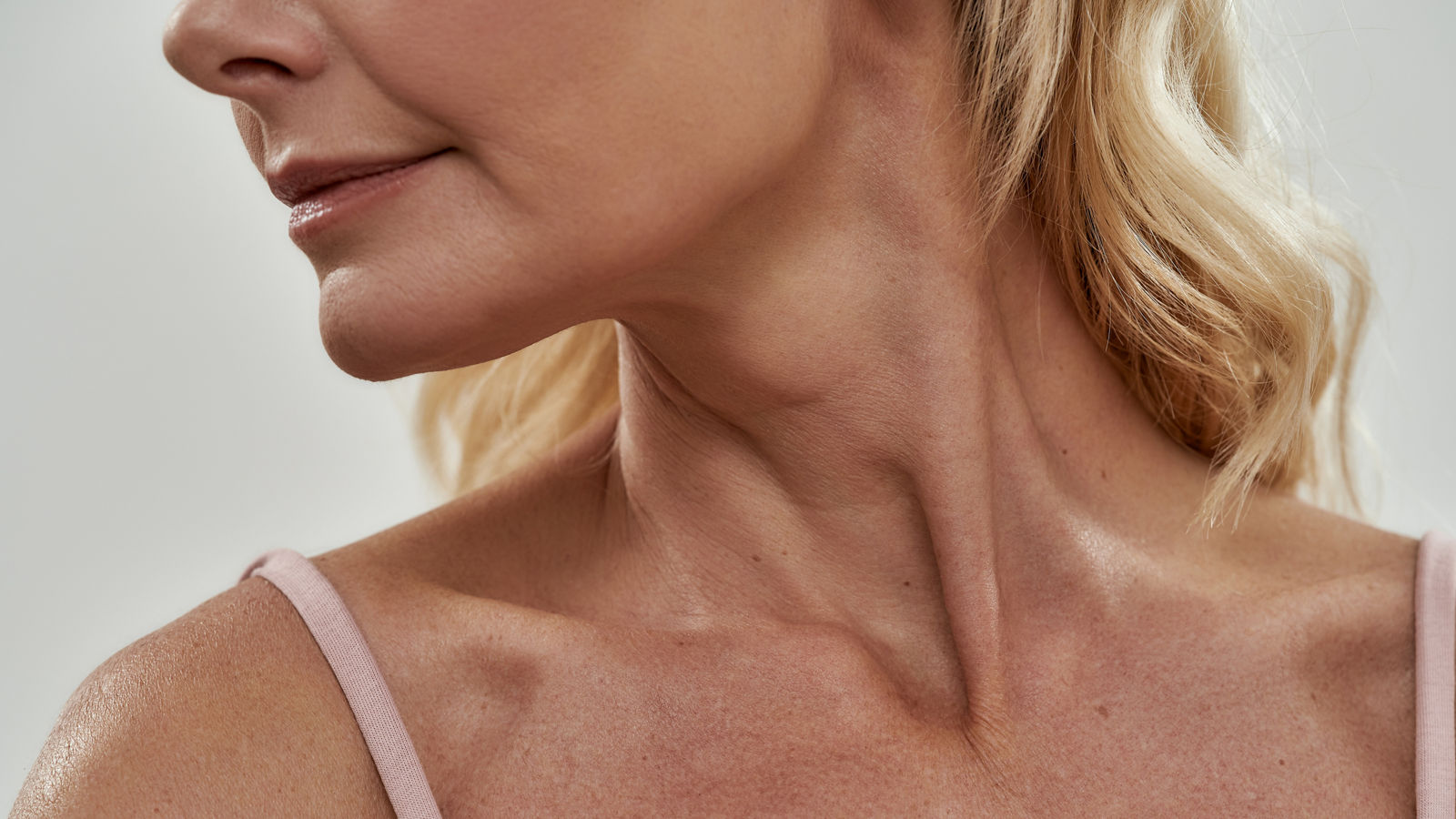 Close up view of middle aged caucasian woman chin