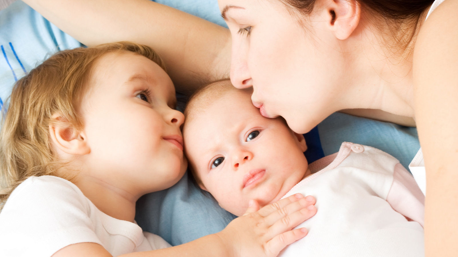 Happy mother with two daughters