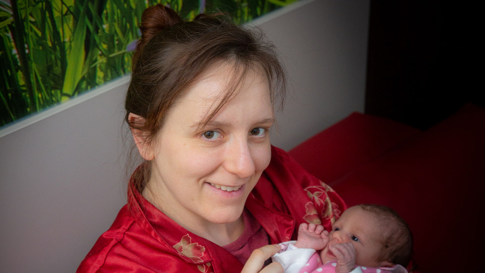 Weihnachtsbaby mit Mutter