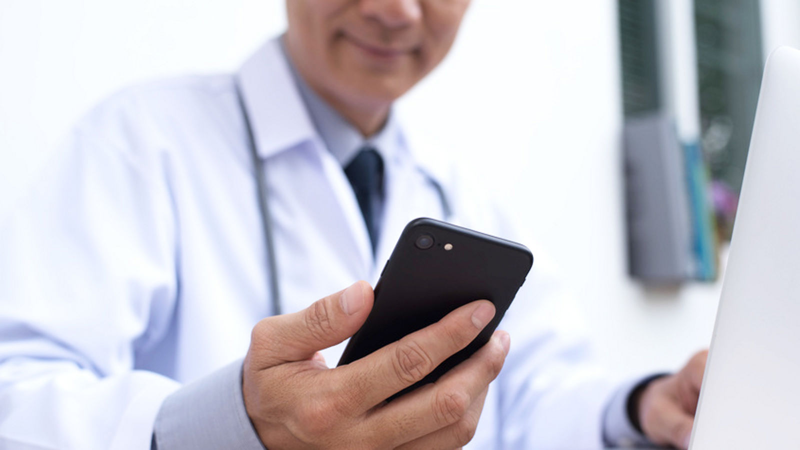 Doctor using smartphone