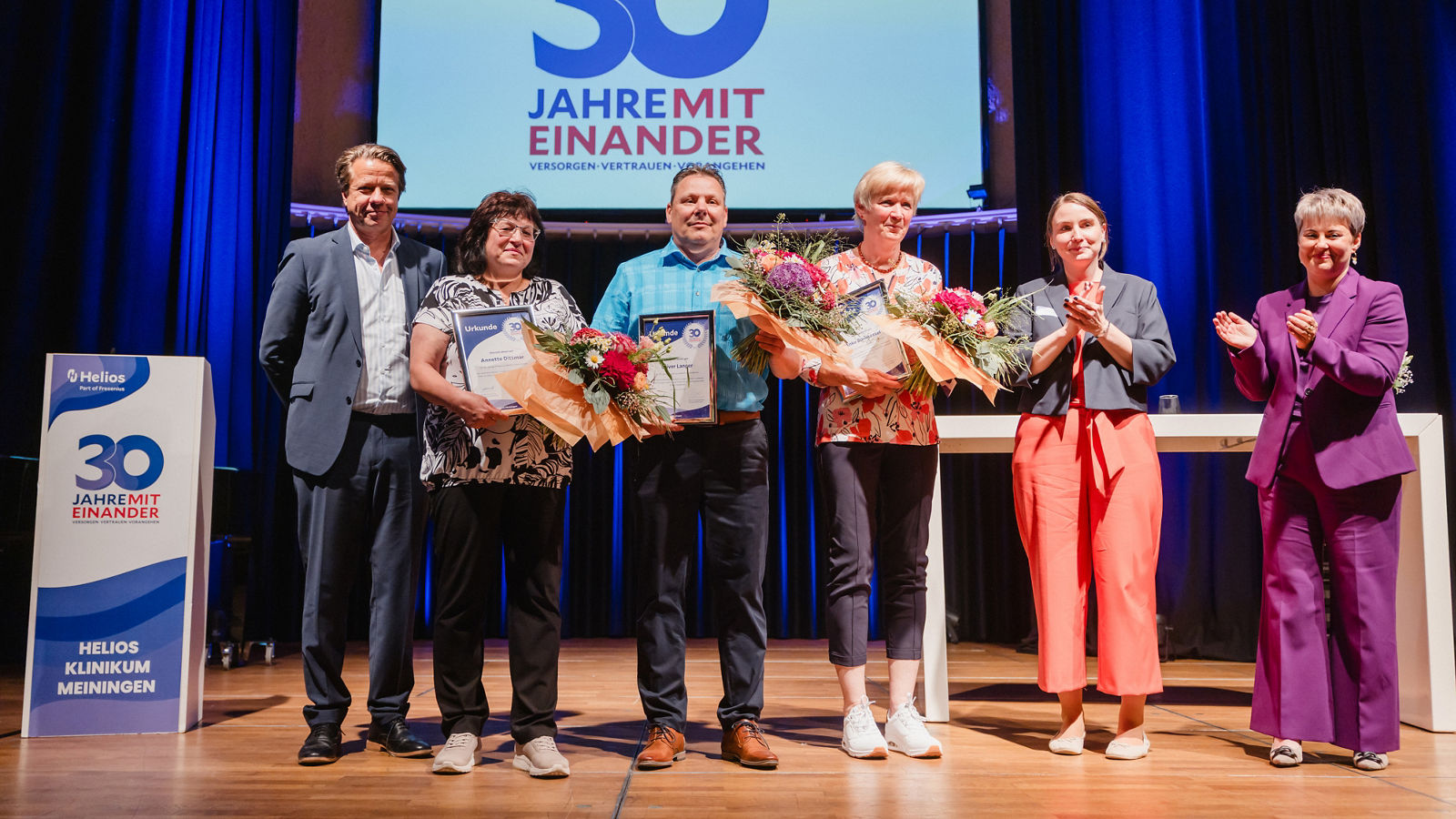 Feierliche Ehrung von drei Mitarbeitenden