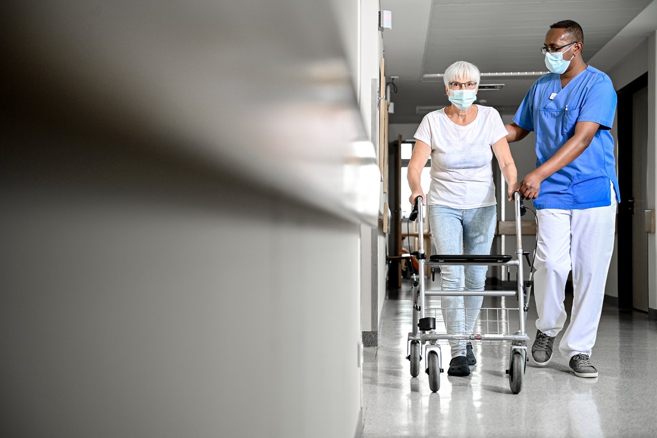 A specially trained carer (R) provides support to an elderly woman on a corridor of a hospital in Schwelm, Germany, 08 July 2020. According to experts, the corona crisis will lead to a sharp rise in unemployment in many industrialized countries by the end of the year. Even without a second wave of infection, this could rise to an average of 9.4 percent in the states of the Organisation for Economic Cooperation and Development (OECD), according to the OECD employment outlook. If a second wave of infection were to occur, economists expect it to rise to 12.6 percent.