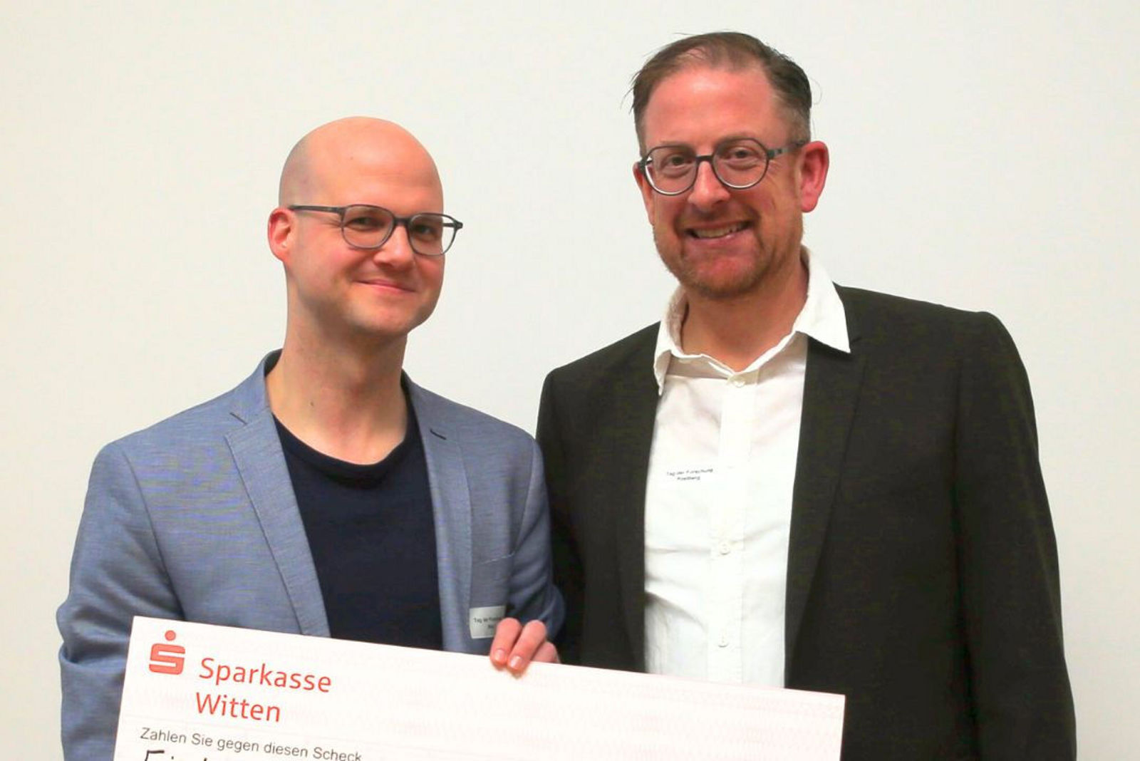 Foto Preisverleihung Dr. Weil & Prof. Postberg 