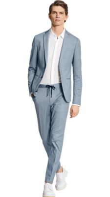 blue suit with white shoes