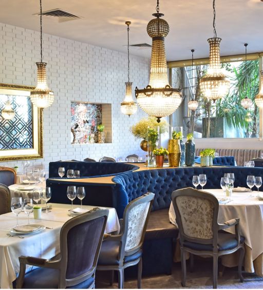 Restaurant Olivier Avenida in Lissabon von innen mit Tischen und Stühlen