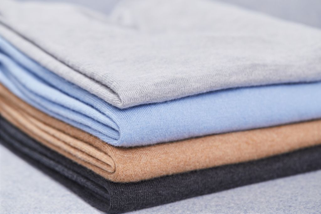 Pile of cashmere products by BOSS