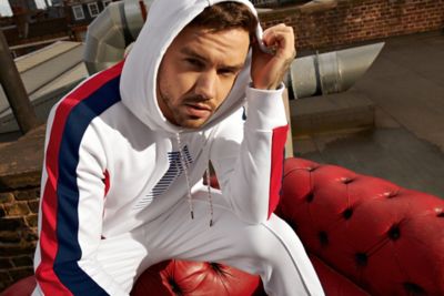 red tracksuit with white writing