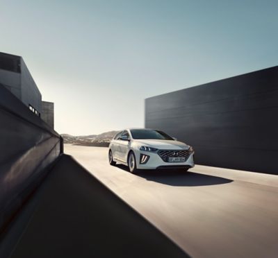 Hyundai car driving in between shadows