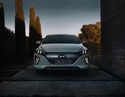 Picture of the new Hyundai IONIQ Electric parked on the street.