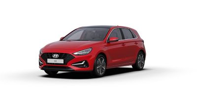  Vooraanzicht van de Hyundai i30 in de kleur Engine Red.