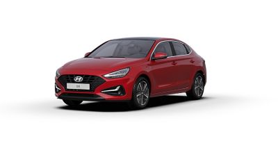 Nowy Hyundai i30 Fastback w kolorze Sunset Red.