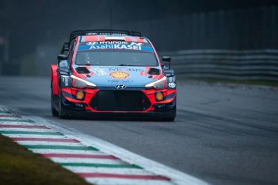 The Hyundai i20 Coupe WRC on track from the front.