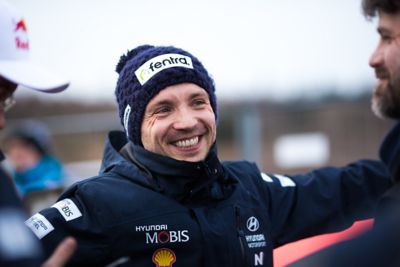 Hyundai Motorsport co-driver Nicolas Gilsoul smiling at crew members