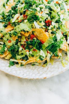 Close up of a salad with nacho chips plant-based lunch.