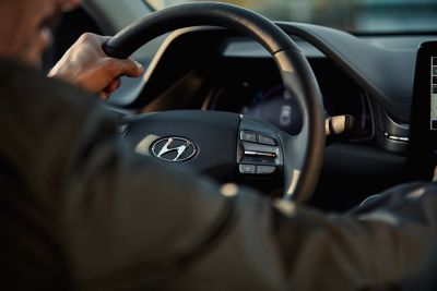Picture of the person driving the new Hyundai IONIQ Electric.