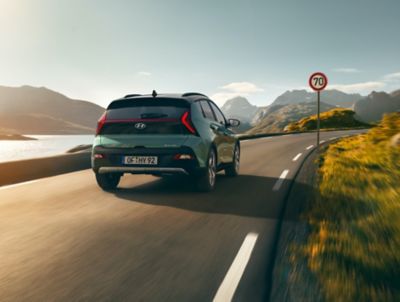 An all-new Hyundai BAYON compact crossover SUV&nbsp;on the road from above.