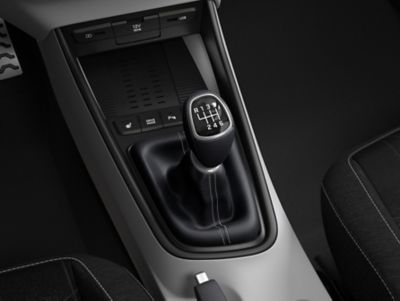 A manual transmission gear lever inside the all-new Hyundai BAYON compact crossover SUV.