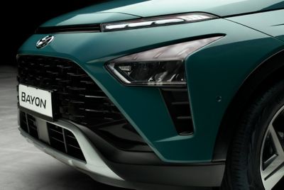 Image of the front headlight of the all-new BAYON in Mangrove Green