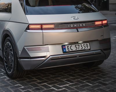 The back of the Hyundai IONIQ 5 electric vehicle with no exhaust pipes, creating less noise.