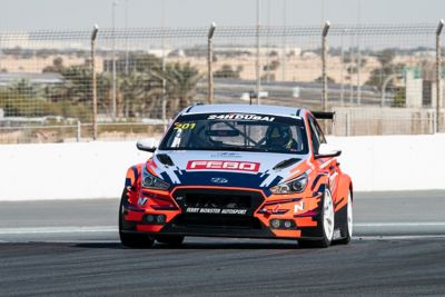  A picture of Hyundai Motorsport customer racing i30 N TCR in action on a racetrack.
