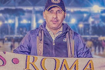 A photo of Francesco, AS Roma supporter who has attended more than 450 games.