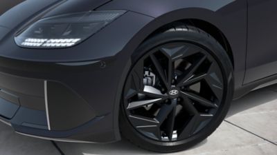 The 20" black alloy wheels with a matte black finish on the new all-electric Hyundai IONIQ 6.