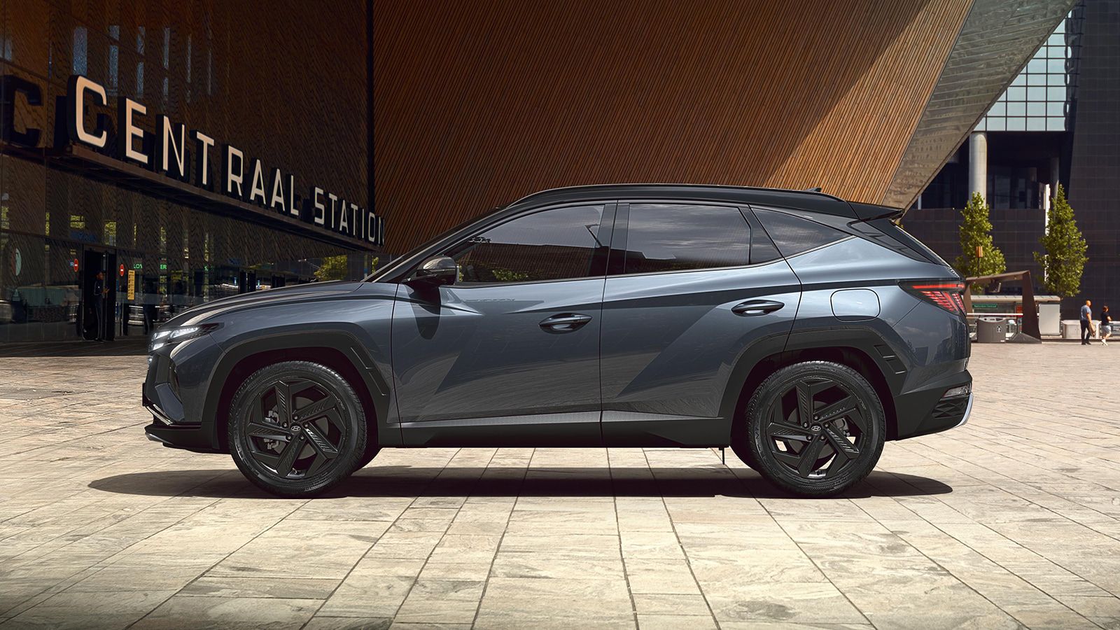 Hyundai TUCSON Plug-in Hybrid in Dark Teal Metallic sideview
