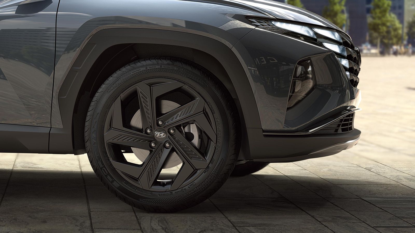 Hyundai TUCSON Plug-in Hybrid in Dark Teal Metallic detail view of the wheels