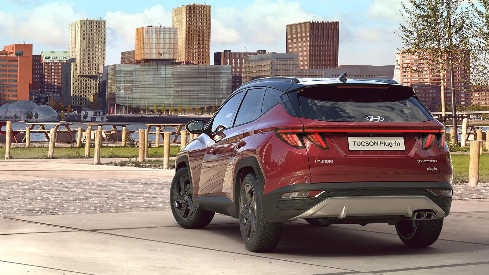 Hyundai TUCSON Plug-in Hybrid in Sunset Red Pearl rear view