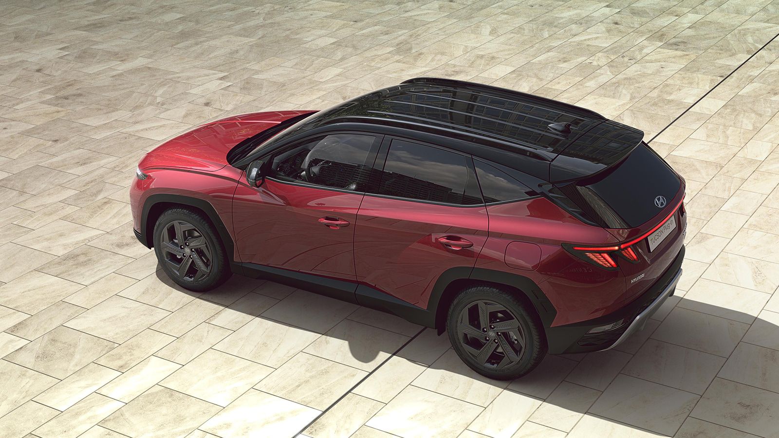 Hyundai TUCSON Plug-in Hybrid in Sunset Red Pearl top view
