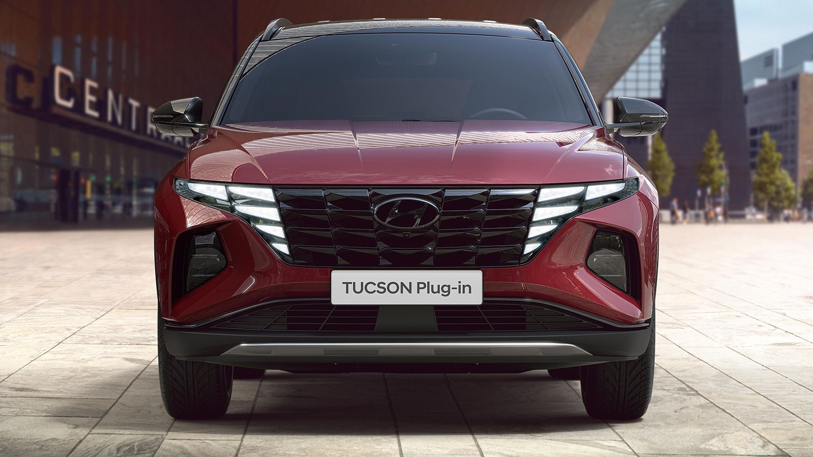 Hyundai TUCSON Plug-in Hybrid in Sunset Red Pearl front view