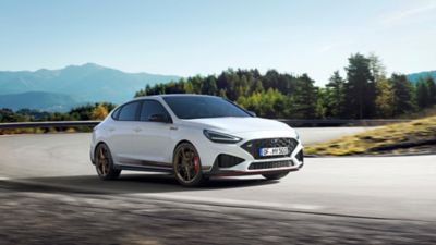 Hyundai i30 Fastback N Drive-N Limited Edition pictured from the front in Serenity White Pearl.