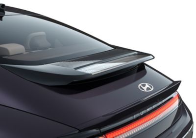 Rear spoiler of the Hyundai IONIQ 6 with transparent material showing the LED lighting