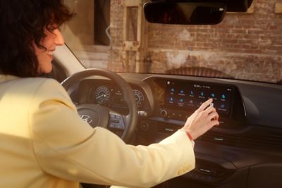 Women using the 10.25" touchscreen in the all-new Hyundai BAYON compact crossover SUV.