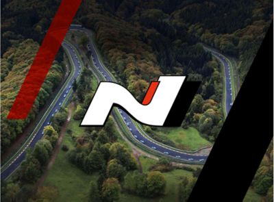The Hyundai N badge with a racetrack in the background.