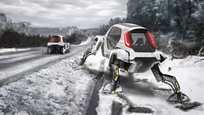 Hyundai Elevate walking car con le racchette da neve che navigano in un ambiente innevato