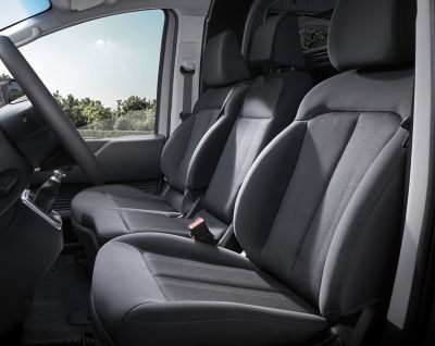 The spacious and comfortable driver and passanger seat in the all-new STARIA Van's cockpit.