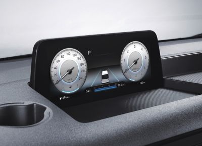 A view of the all-new STARIA Premium's dashboard with the digital cluster display on top of it.
