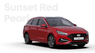  The Hyundai i30 Wagon in the colour Sunset Red Pearl.