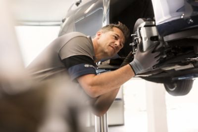 Hyundai technician servicing a car