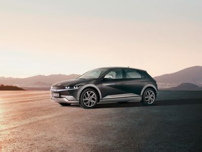 The Hyundai IONIQ 5 in Phantom Black with side trim lines and door mirror caps in brushed aluminium.