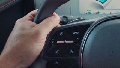 Close up of the controls for voice recognition in the Hyundai IONIQ 5 electric midsize CUV.