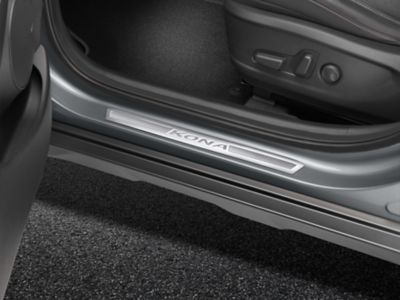 Genuine Accessories stainless steel entry guards of the Hyundai Kona Electric.