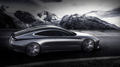 Rendering of the back of the 2018 Le Fil Rouge concept car driving in front of a mountain range.