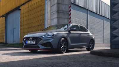 Hyundai i30 Fastback N in an industrial warehouse setting