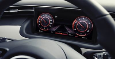 Close-up van het digitale 10,25"-intstumenenbord van de Hyundai TUCSON.